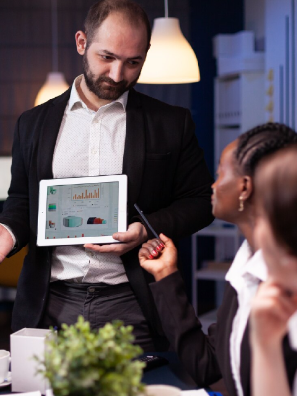 Professional working with technology to address challenges